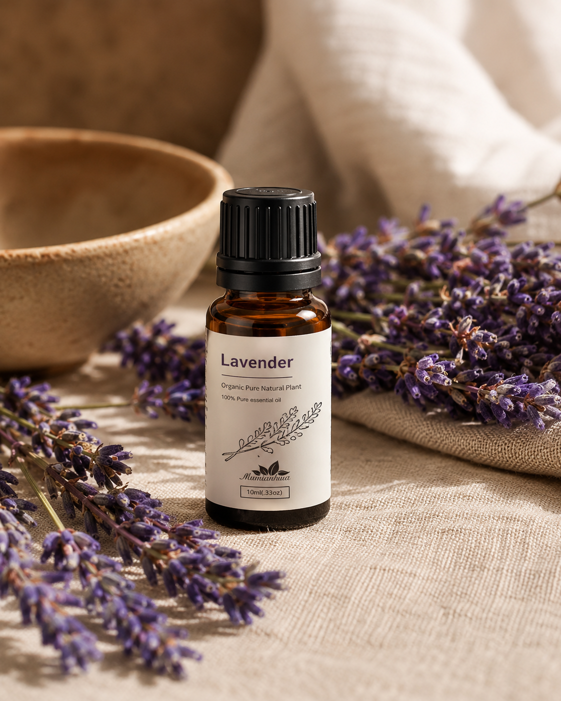Amber Wellthious essential oil bottle surrounded by fresh lavender sprigs on warm linen